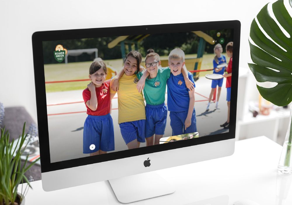 Image of Beaver Green Primary School website header on an iMac